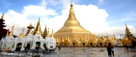 Shwedagon pagoda with white clouds background