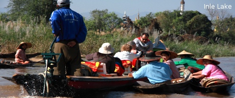 Locals in Inle Lake selling items to the tourists.