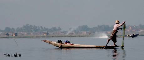 A fisherman rowing boat in Inle